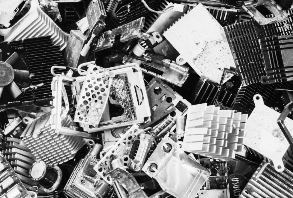 Black and white image of e-waste, a key critical mineral supply